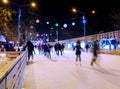 People are skating on rink