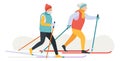 People skiing. Old couple walking on skis at winter