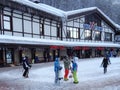 People with skis and snowboards, ski resort Rosa Khutor, Russia