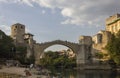 People on the small beach under the famous Stari Most bridge in Mostar Royalty Free Stock Photo