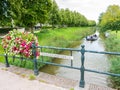 Boat on canal and bridge in old town of Bolsward, Friesland, Net