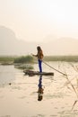 People with small boat on Van Long pond, Ninh Binh province, Vietnam Royalty Free Stock Photo