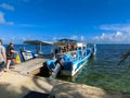 The people at snorkeling underwater and fishing tour by boat at the Caribbean Sea at Roatan, Honduras