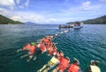 People snorkle in a bay of tarutao Royalty Free Stock Photo