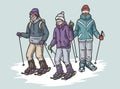 People in snowshoes on top of a snowy mountain. Snowshoeing in winter mountains. Sporty winter hiking or winter sport