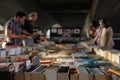 People sorting books at outdoor Book Market at London Bridge Royalty Free Stock Photo