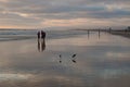 People on a southern California, USA beach at sunset Royalty Free Stock Photo