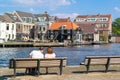 People and Spaarne river in Haarlem, Netherlands