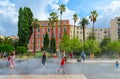 People are in spatter of water of fountain in gardens of Albert I, Nice, France