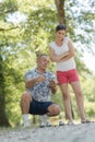 People at sport playing game petanque