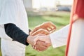 People, sports or handshake for team greeting, introduction or respect on baseball field together. Zoom of men shaking Royalty Free Stock Photo
