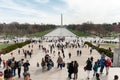 People on a stairs of Lincoln memorial and view on Washington