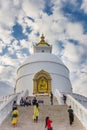 People on the stairs of the World Peace Pagoda in Pokhara