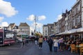 People and stalls, stores, cafe and restaurant at Markt Maastricht in Maastricht, Netherlands. Royalty Free Stock Photo