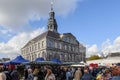 People and stalls, stores, cafe and restaurant at Markt Maastricht in Maastricht, Netherlands. Royalty Free Stock Photo