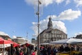 People and stalls, stores, cafe and restaurant at Markt Maastricht in Maastricht, Netherlands. Royalty Free Stock Photo