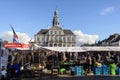 People and stalls, stores, cafe and restaurant at Markt Maastricht in Maastricht, Netherlands. Royalty Free Stock Photo