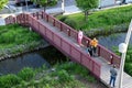 people stand on the bridge on a sunny summer day, Moscow 06.21.2024