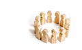 People stand in a circle on a white background. Communication. Business team, teamwork, team spirit. Wooden figures of people. Royalty Free Stock Photo