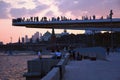 People stand on a glass bridge in Zaryadye park in Moscow. Popular landmark. Royalty Free Stock Photo