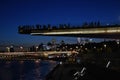 People stand on a glass bridge in Zaryadye park in Moscow. Popular landmark. Royalty Free Stock Photo