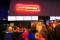 People stand in line for popcorn