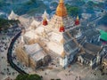 people stand in line at a temple