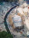 people stand in line at a temple