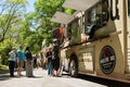 People Stand In Line To Buy Meals From Food Truck