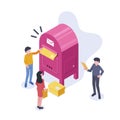 People stand near a large mailbox and send letters. A man and a woman are holding a mail envelope. The concept of email Royalty Free Stock Photo