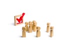 People stand near and look at the check mark in the box. election, poll or referendum. . Voters participate in elections