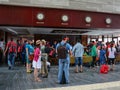 People stand near registration counter