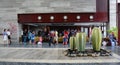 People stand near registration counter