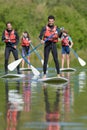 People on stand up paddel boards on lake Royalty Free Stock Photo