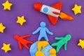 People standing on Earth and launching space rocket into space Royalty Free Stock Photo