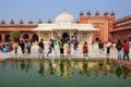 People standing in front of Tomb of Salim Chishti in the courtyard of Jama Masjid, Fatehpur Sikri, India. Royalty Free Stock Photo