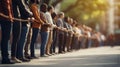 People standing in line with their hands tied together, AI Royalty Free Stock Photo