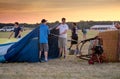 People start to inflate a hot air balloon