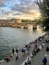 people stay in relax on the seine river bank Royalty Free Stock Photo