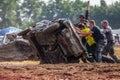 People on a Stockcar on a dirty track at a Stockcar challenge. Royalty Free Stock Photo