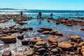 People, stone, beach and sea