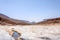 People on the stone river, Draa valley (Morocco)