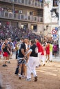 People on the street with the bull bound in Chiva