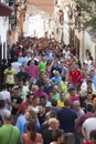 People on the street with the bull bound in Chiva