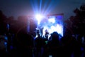 People at a street concert in the evening