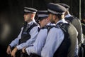 People on the street during the London Fashion Week. Police guarding the crowd