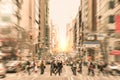 People on the street on Madison Avenue in Manhattan downtown before sunset in New York city - Commuters walking on zebra crossing Royalty Free Stock Photo
