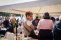 People at street markets in Menaggio town square Lake Como