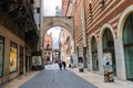 People on the street outside Palazzo della Ragione in Verona