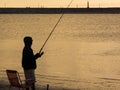 Man fishing at the lake Royalty Free Stock Photo